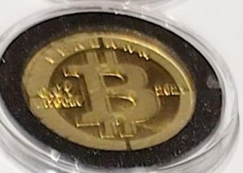 Design C — colored border with BTC tribal · Brass